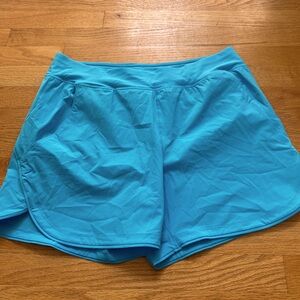 A bright blue pair of swim shorts.